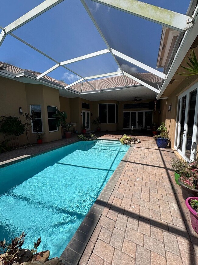 Building Photo - Spacious 3/3.5 3 car garage home in Palm City