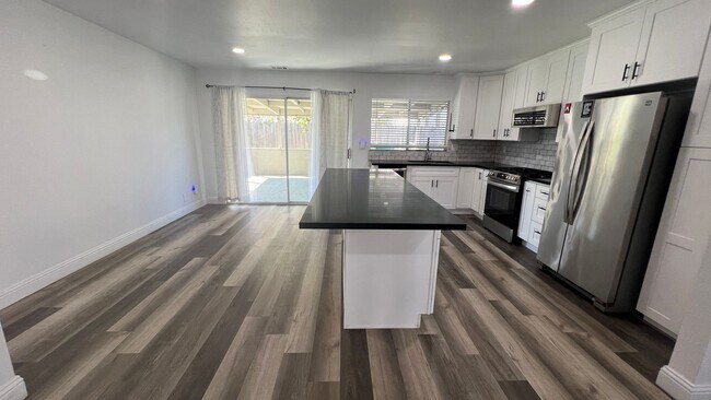 Building Photo - UPGRADED 4 bedroom 2 bathroom home