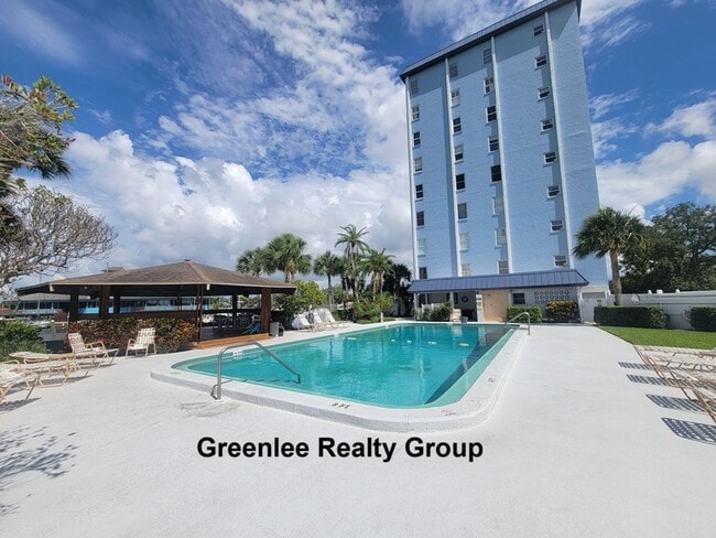 Building Photo - Waterfront Living & Maintenance Free Living at Its Finest – With Views You’ll Never Get Tired Of!