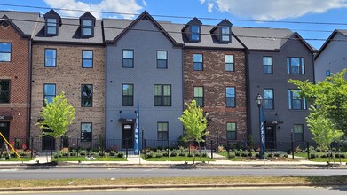 Building Photo - Exceptional Luxury Townhouse with 2 Car Ga...