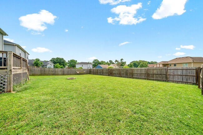 Building Photo - Spacious 4-Bedroom Home with Modern Upgrad...