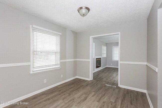 Building Photo - 7706 Poinsettia Dr
