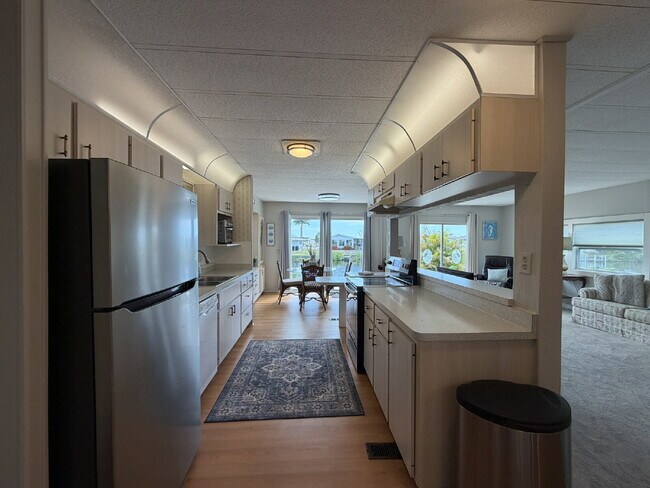 Building Photo - "Charming 2-Bed, 2-Bath Mobile Home Retreat in Harbor Cove!"