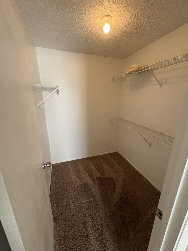 Building Photo - WRAP AROUND PATIO  - LARGE TWO BEDROOM READY NOW!!  $1400 MONTHLY RENT includes water