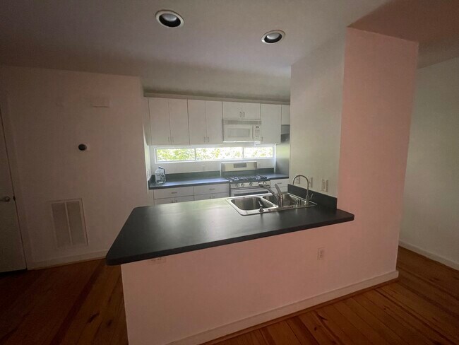 Kitchen view from dining area - 2715 Chenevert St