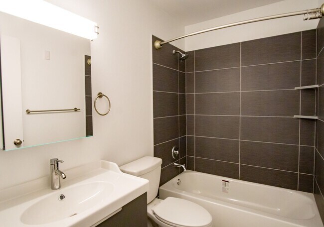Building Photo - Stunningly Renovated Spacious 2-Bed w/Built-ins, DW, WD, Parking + More!