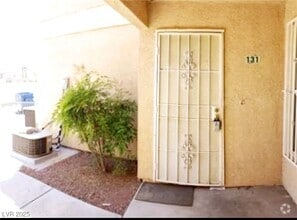 Building Photo - 1830 N Pecos Rd