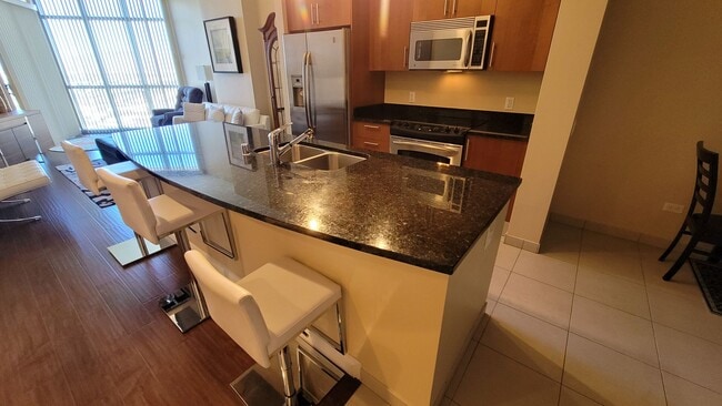 Building Photo - ***GORGEOUS FURNISHED 1 BEDROOM CONDO AT A...