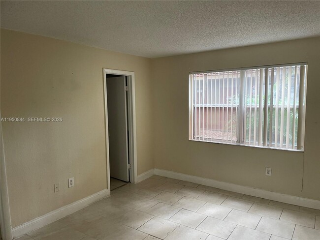 Building Photo - 4235 N University Dr