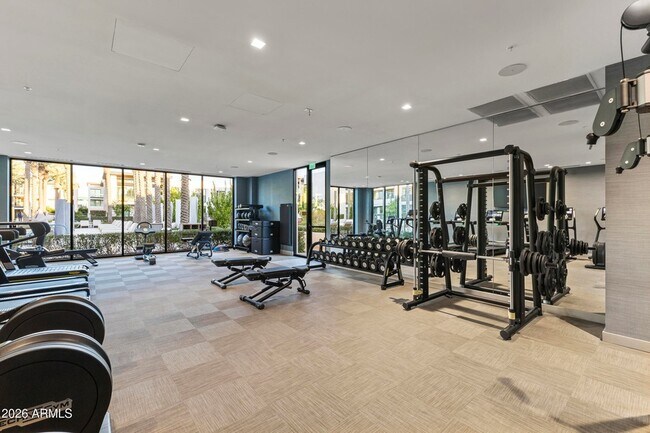 Building Photo - 6587 N Palmeraie Blvd