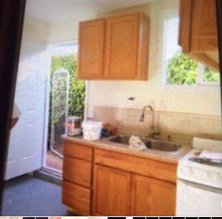 Kitchen and Entrance - 1611 103rd Ave