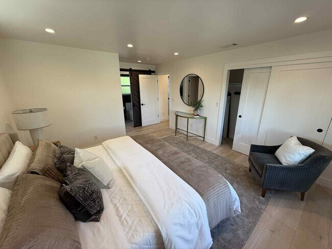 Building Photo - Modern 4-Bedroom Retreat in San Carlos – Remodeled, Spacious, Private Yard