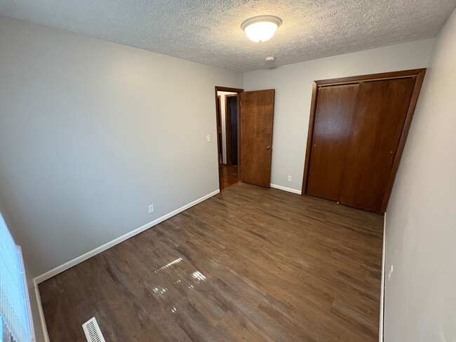 Building Photo - Spacious Single-Family Home with Fenced Backyard & Attached Garage