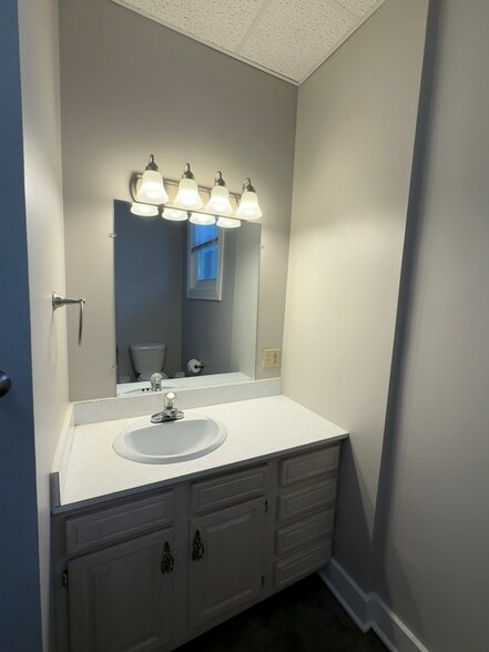 Bathroom sink - 112 W Main St