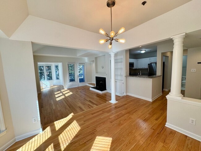 Building Photo - Top-Floor End Unit Condo at New Bern Place