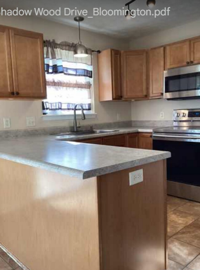 Building Photo - A MUST SEE HOME IN WOODGATE!