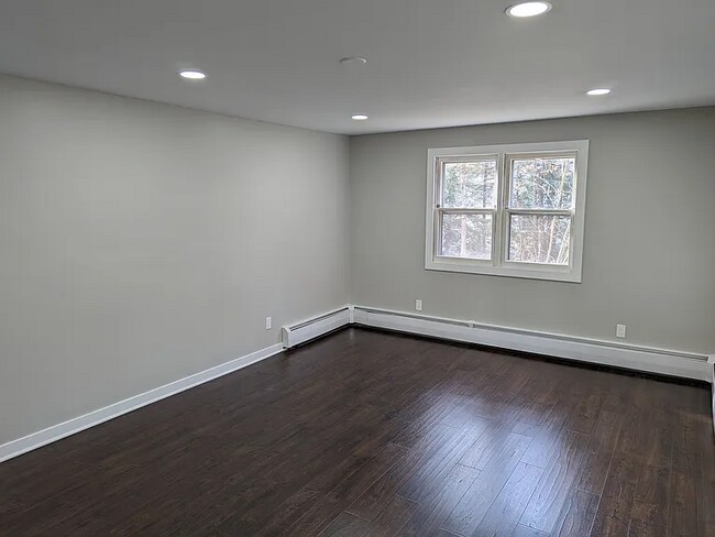 Building Photo - this contemporary & brightly remodeled 2,400 sqft home