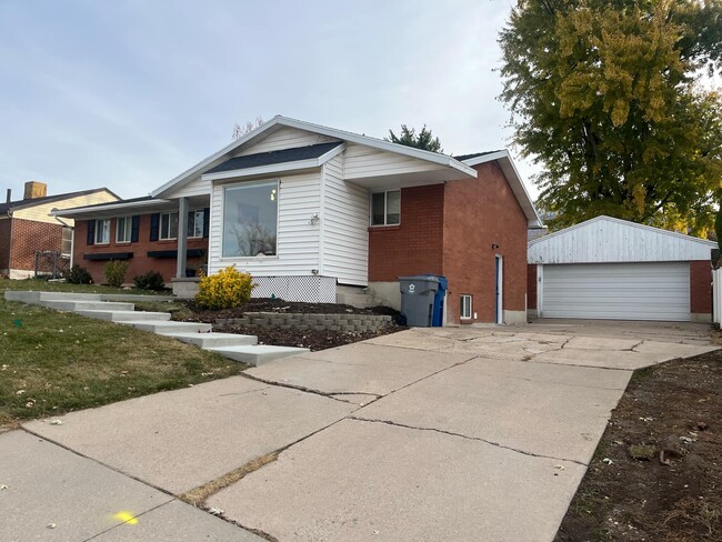 Side of Home Showing the Unit's Door - 4380 Porter Ave