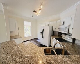 Building Photo - Stunning 2/2 Condo For Rent in Mirabella - Superb Location!