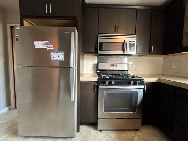 Building Photo - Stylish Condo at Terrazzo with Hardwood Floors, Open Modern Kitchen & Great Location