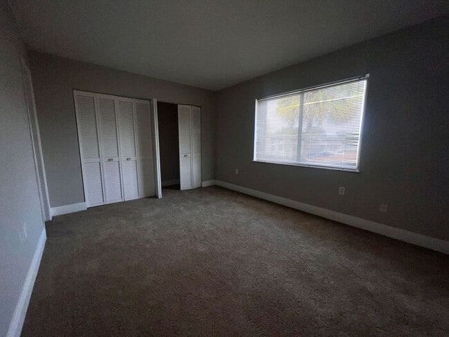 Building Photo - Spacious 3 Bed / 2 Bath Condo in Millennium Palms – Gated Community with Great Amenities!