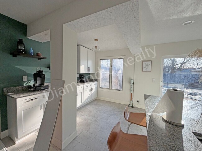 Building Photo - Stunning 3_Bed Home with Two Primary Suites & a Pool!