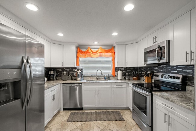 Building Photo - 7240 Westwind Dr