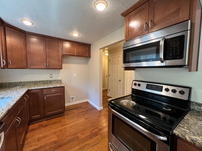 Building Photo - $300 OFF Move in Costs!  Elegant Four Bedr...