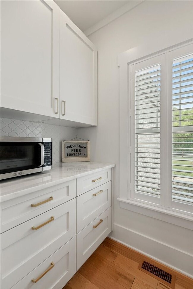 Building Photo - unning custom-built home on a full acre in...