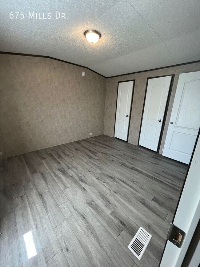 Building Photo - 675 E Mls Dr