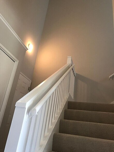 Stairs to loft - 8 Shoreline Ct