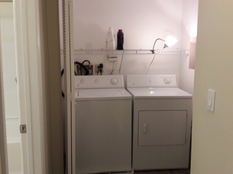 In-unit laundry closet with washer & dryer - 1801 E Katella Ave
