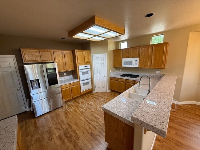 Building Photo - 9950 Moccasin Ct