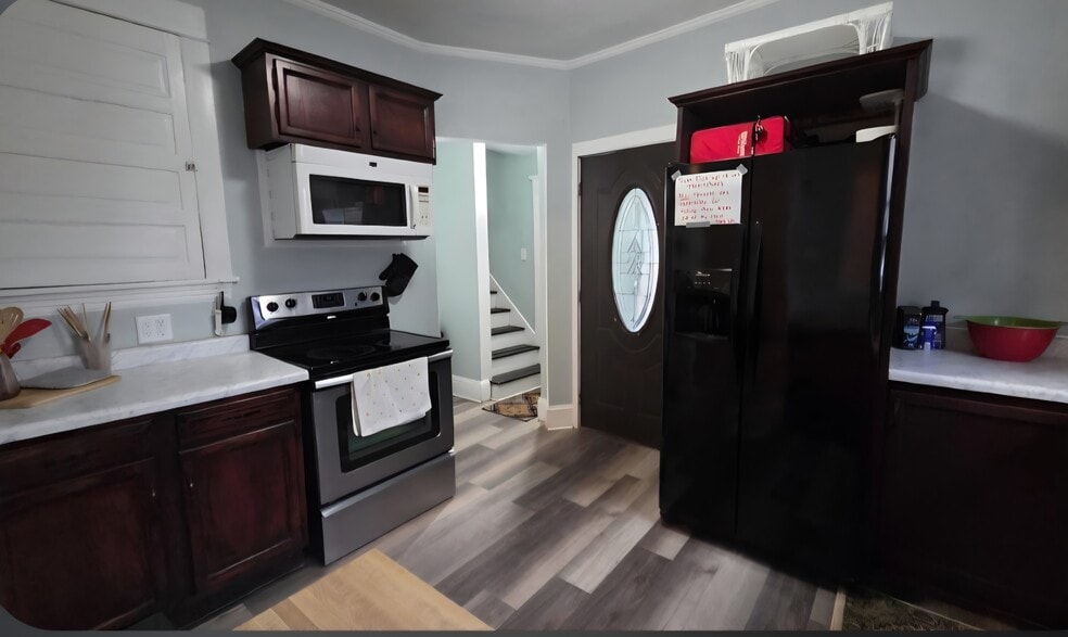 Back staircase to private suite - 1128 Portage Ave