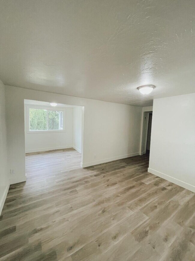 Building Photo - Available Now — 1 BR / 1 BA Creekside Duplex Unit in Millcreek — $1,200/mo