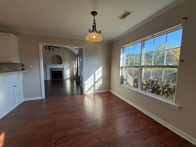 Building Photo - Spacious 3 BR/2BA Home + Formal Dining Roo...