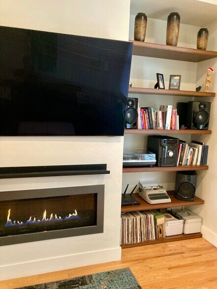 Cozy gas fireplace, built-in floating shelves - 2153 N Downing St