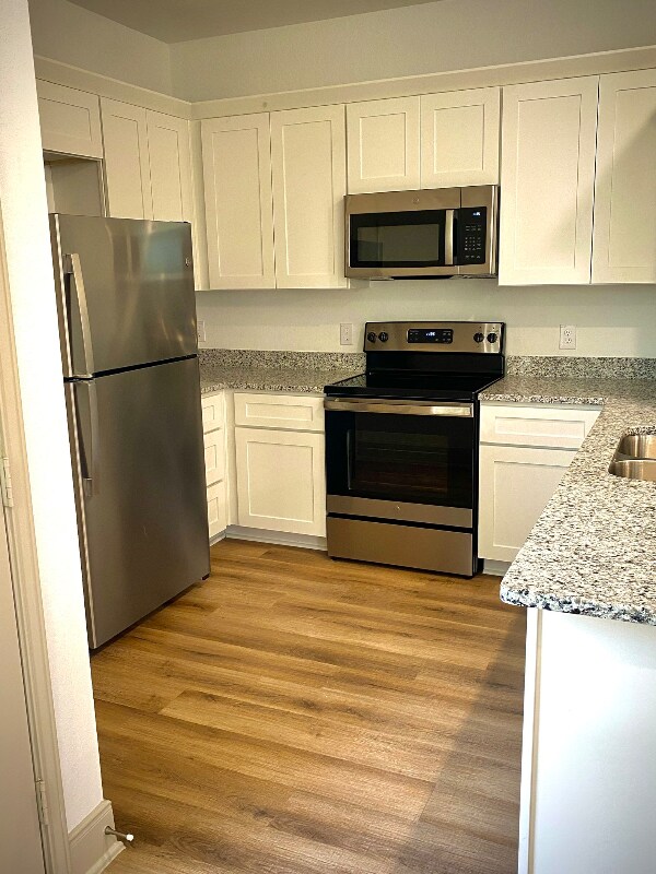 Building Photo - 7512 Magnolia Vlg