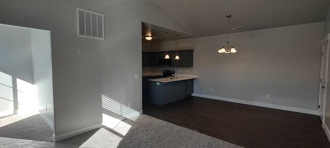 Building Photo - LIKE NEW TOP FLOOR HERRIMAN CONDO - AVAILA...