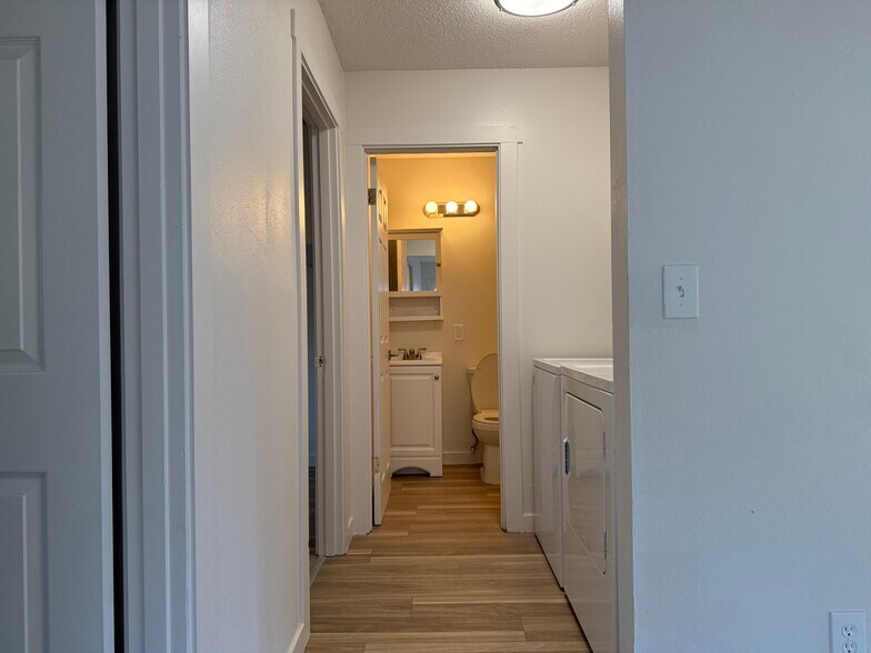 Hall to bathroom with full size washer/dryer - 2107 Y St