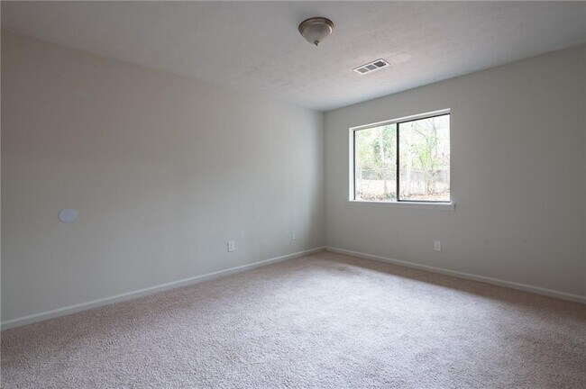 Building Photo - 9250 Woodgreen Way