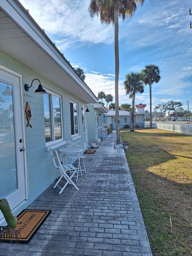 Building Photo - NSB FURNISHED EFFICIENCY UNIT-ALL UTILITIES INCLUDED INCLUDING WI-FI!