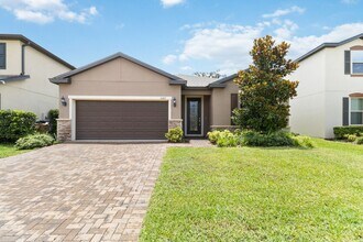 Building Photo - Gorgeous Energy Efficient 4/2 Home in Gated Community Close to Lake Nona