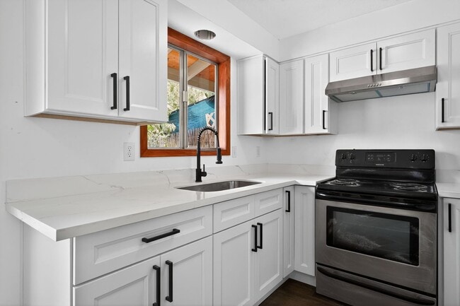 Building Photo - Half off the first month's rent!