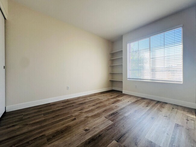 Building Photo - REMODELED, SPACIOUS, 4 BEDROOM HOME WITH VAULTED CEILINGS AND LOFT