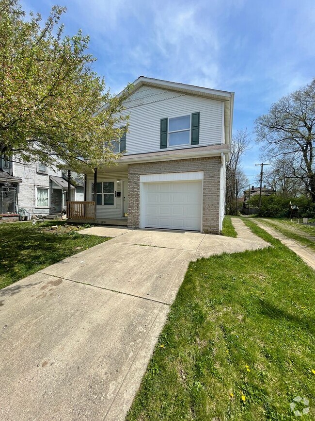 Building Photo - For Rent: 4-bedroom 2-bathroom single fami...