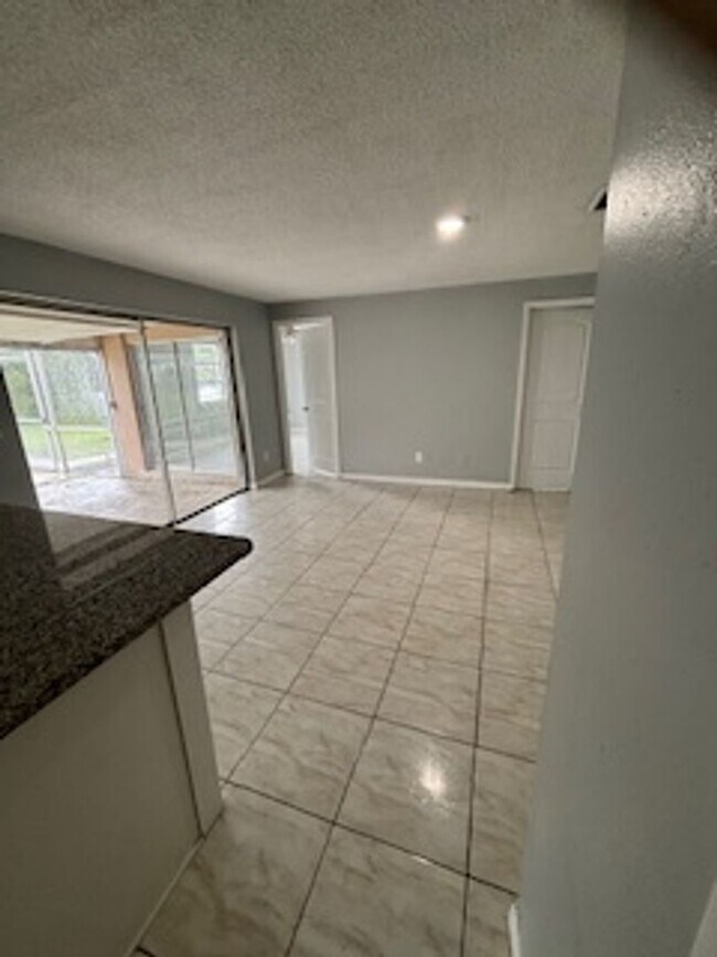 Building Photo - Large  3 bedroom, 2 bath pool home.