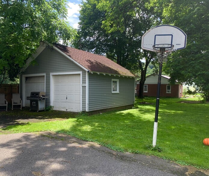 Off-street parking with one garage - 136 Main St