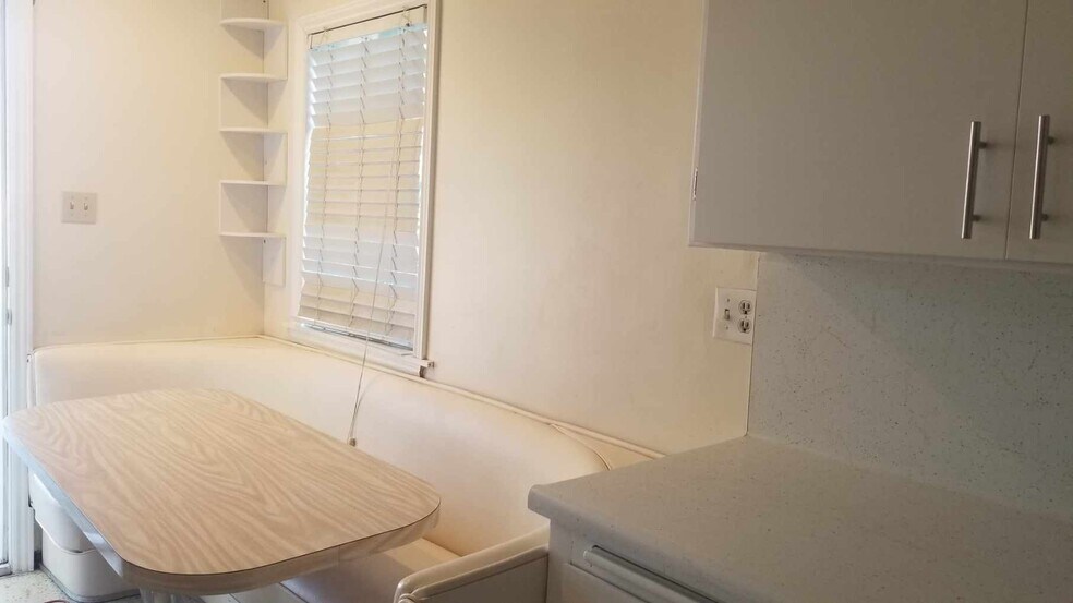 Kitchennet seating area - 6851 Wilbur Ave