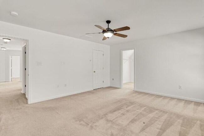 Building Photo - Spacious 5 Bedroom Home with 3rd Floor Suite, Fenced Yard & Community Amenities – $3,500/mo